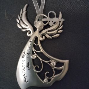 Ornament: A mom is an Angel with invisible wings. Color: silver.